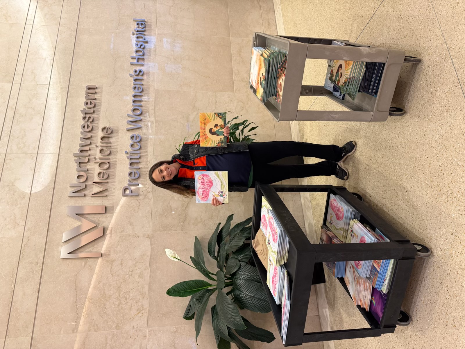 Jenna delivering donated books to Northwestern Medicine Prentice Women's Hospital